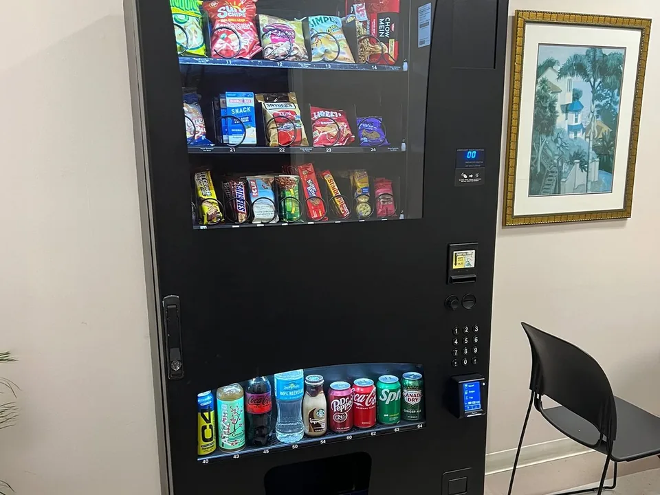 A Better Choice Vending snack machine installed in a Brevard County office breakroom